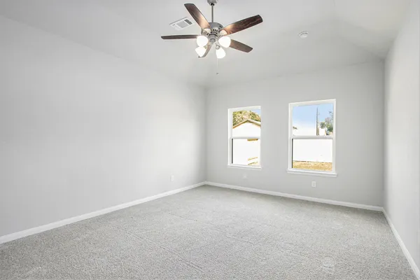 a bathroom with a sink a toilet a shower and a mirror