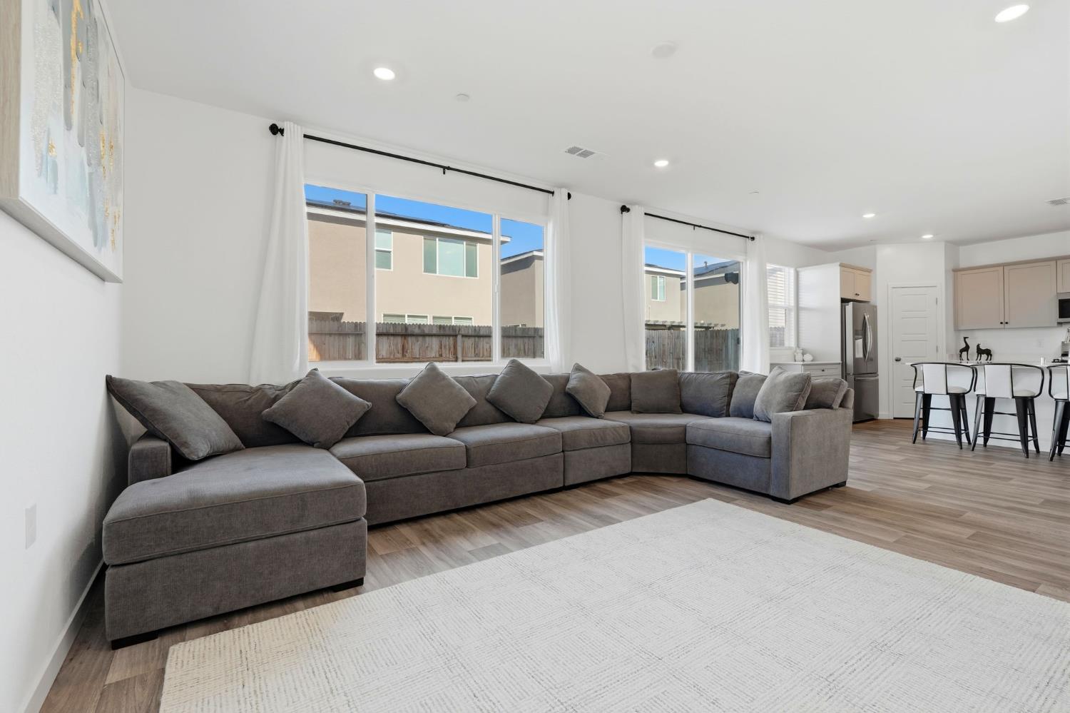 4225 Hampton Way Clovis, CA 93619 - Photo 28 of 64 a living room with furniture and a large window