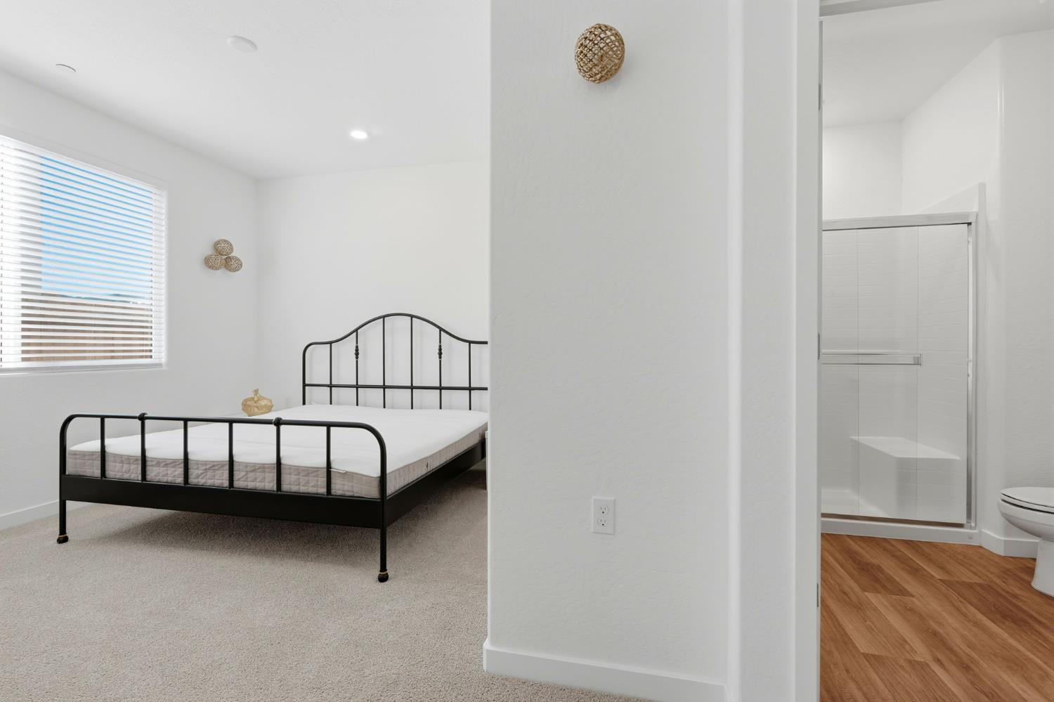 4225 Hampton Way Clovis, CA 93619 - Photo 34 of 64 a bedroom with a bed and window