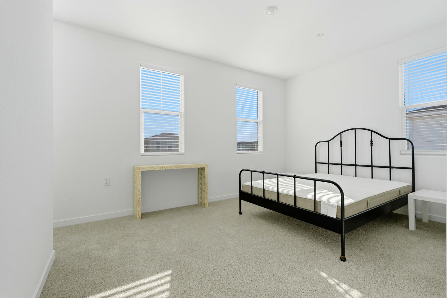 4225 Hampton Way Clovis, CA 93619 - Photo 41 of 64 a bedroom with a bed and window