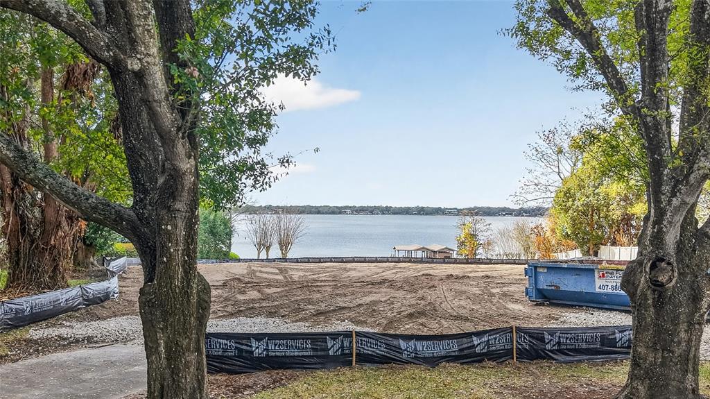2624 Midsummer Drive Windermere, FL 34786 - Photo 2 of 22 a view of a ocean with large trees