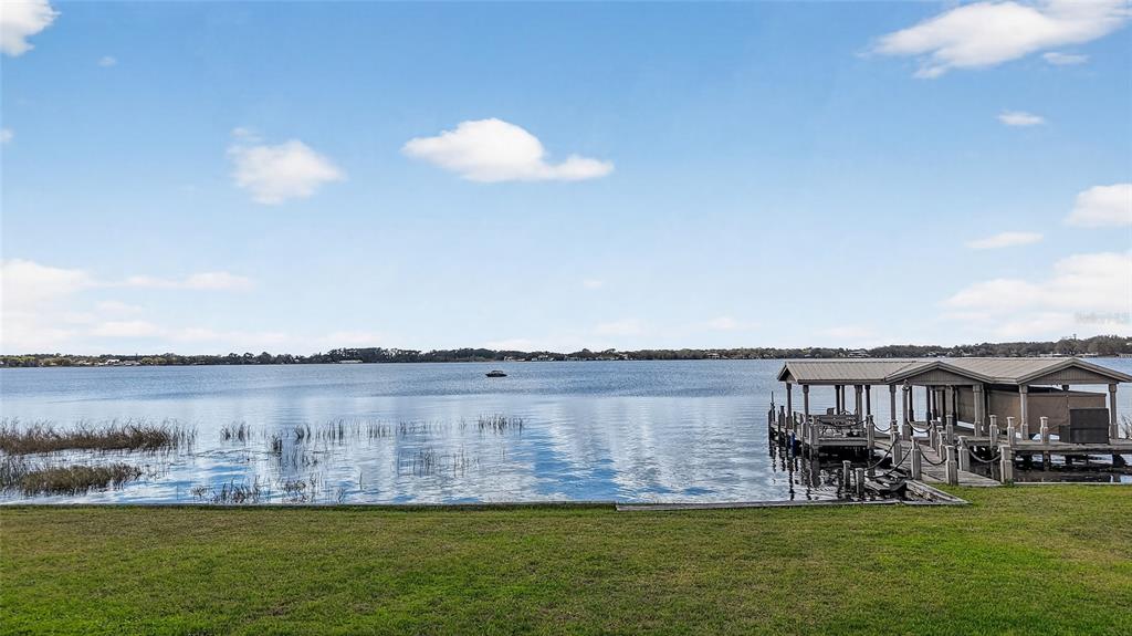 2624 Midsummer Drive Windermere, FL 34786 - Photo 21 of 22 a view of a lake with outdoor space