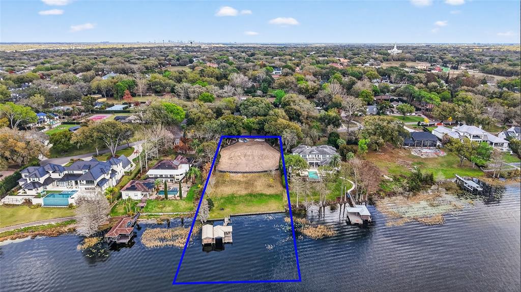 2624 Midsummer Drive Windermere, FL 34786 - Photo 9 of 22 an aerial view of residential houses with outdoor space and swimming pool