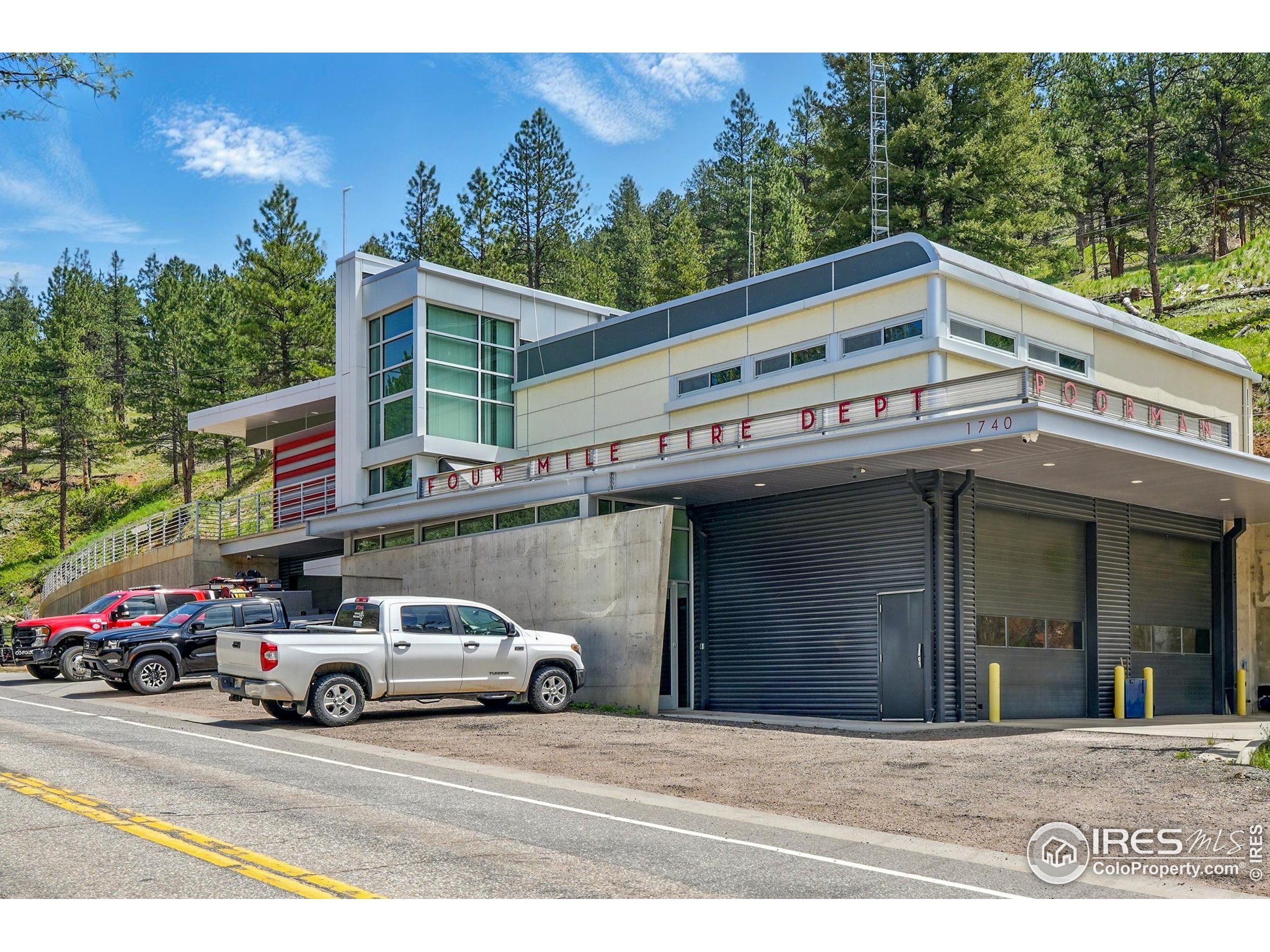 375 Arroyo Chico Boulder, CO 80302 - Photo 14 of 33 a view of a car parked in front of a building