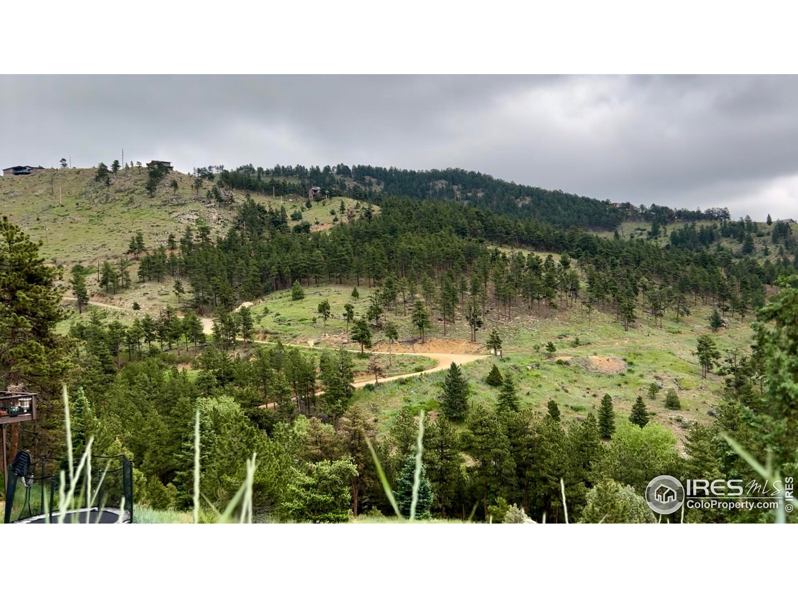 375 Arroyo Chico Boulder, CO 80302 - Photo 17 of 33 a black and white photo of a lake