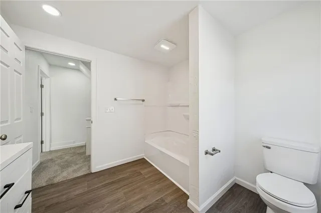 a view of empty room with ceiling fan