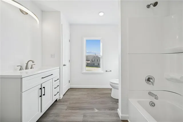 a view of backyard with wooden floor and staircase