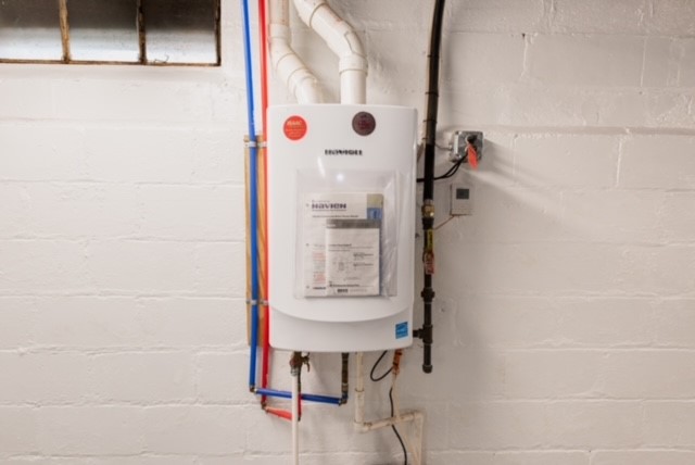 27 Dorset Street Rochester, NY 14609 - Photo 16 of 17 Tankless Hot Water Heater