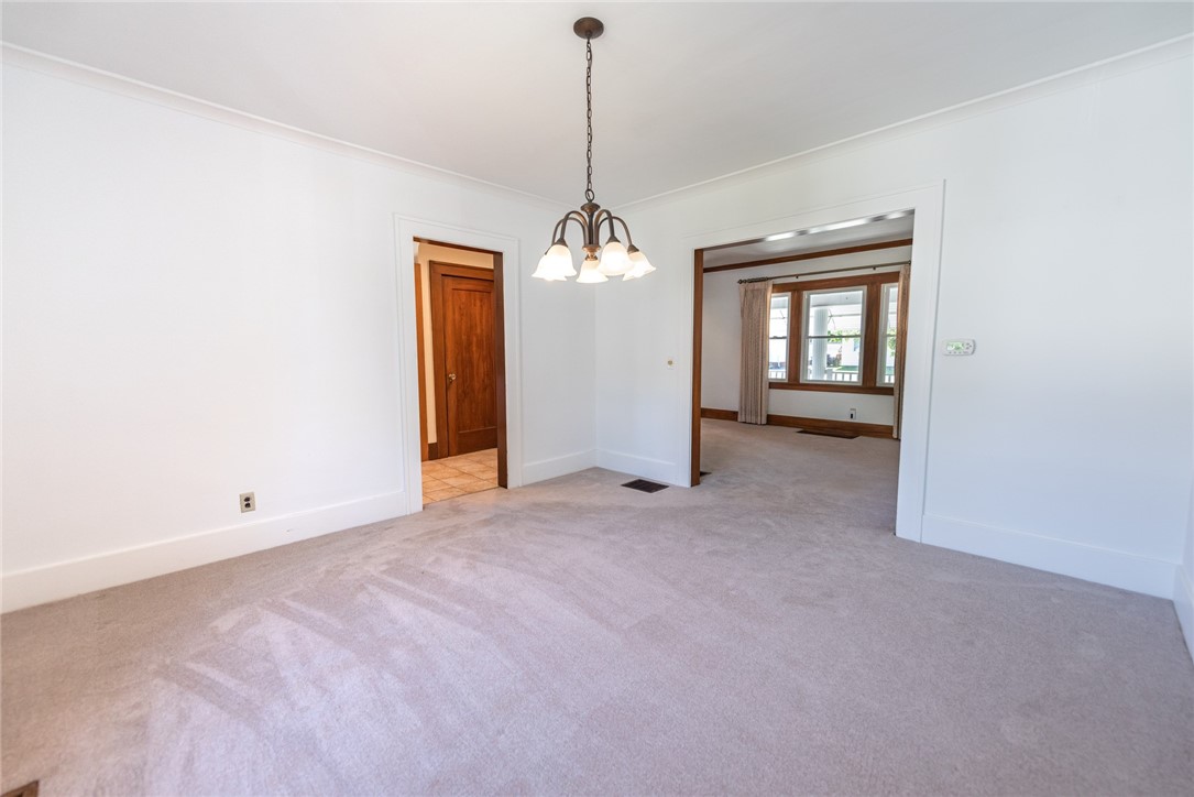 27 Dorset Street Rochester, NY 14609 - Photo 5 of 17 Dining Room Leading to Kitchen and Family Room