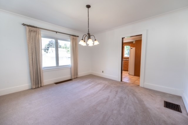 27 Dorset Street Rochester, NY 14609 - Photo 6 of 17 Dining Room Leading to Kitchen