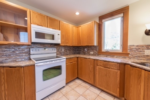 27 Dorset Street Rochester, NY 14609 - Photo 8 of 17 Kitchen With Tile Backsplash, Granite Counter Tops
