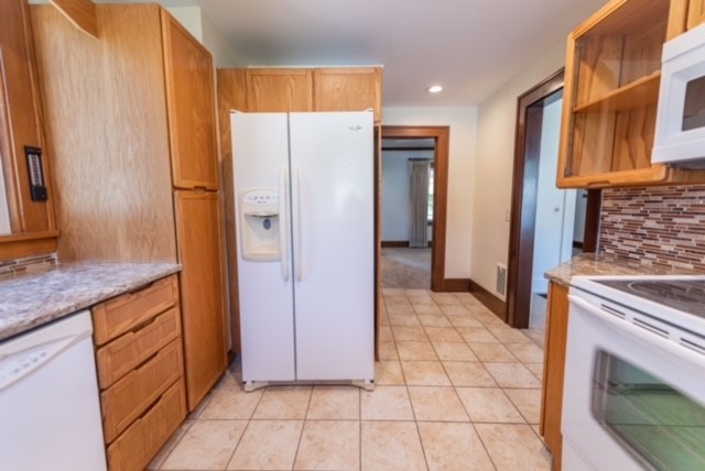 27 Dorset Street Rochester, NY 14609 - Photo 9 of 17 Kitchen Leading To Family room and Dining Room