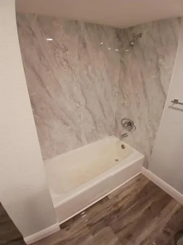 a bathroom with a bathtub