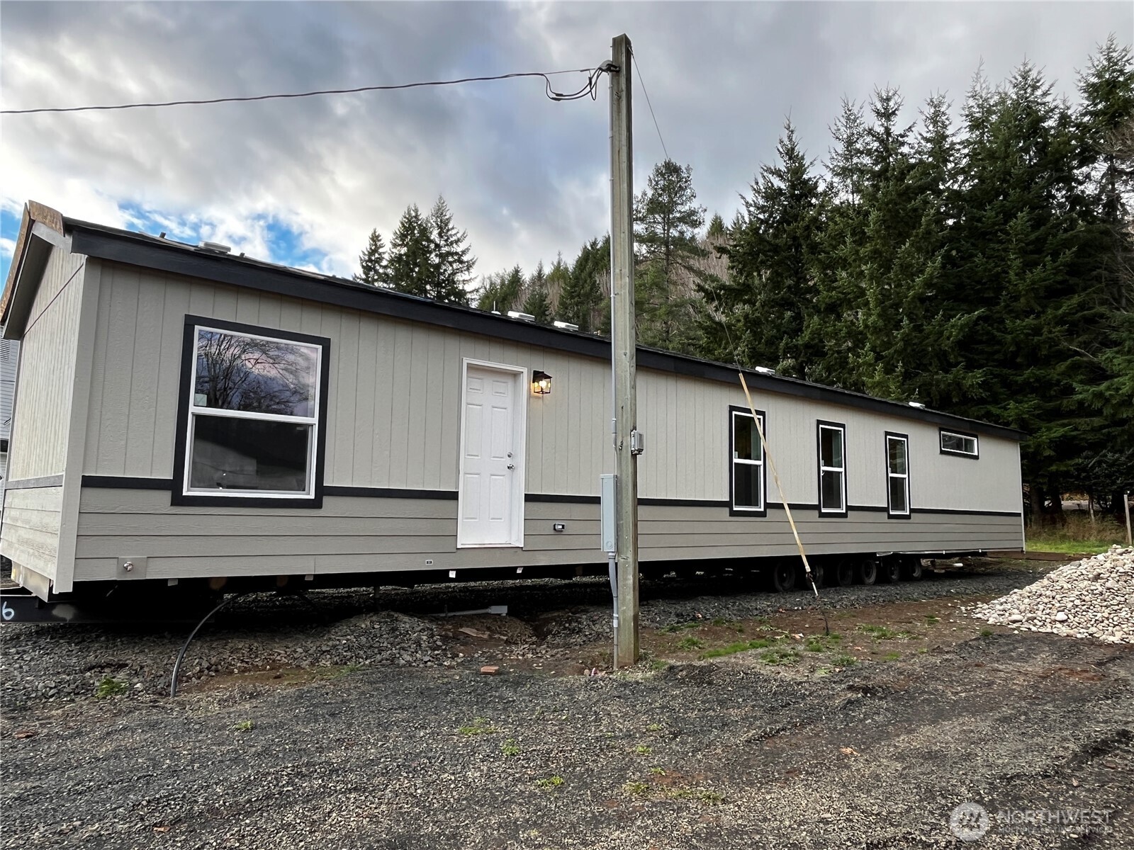 36 Porter Creek Road Elma, WA 98541 - Photo 3 of 16 a house view with a backyard space