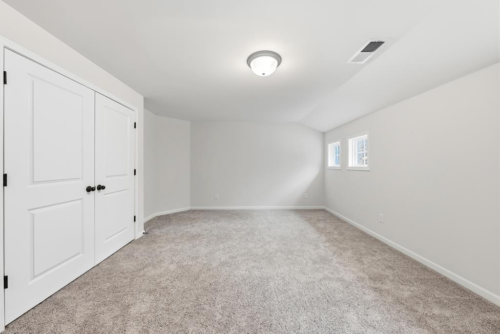 75 Oak Ridge Drive Waverly Hall, GA 31831 - Photo 30 of 40 a view of an empty room with a window