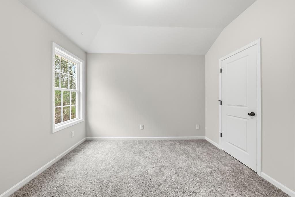 75 Oak Ridge Drive Waverly Hall, GA 31831 - Photo 33 of 40 a view of an empty room with a window