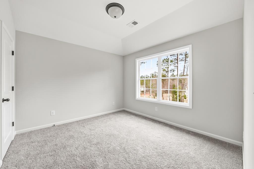 75 Oak Ridge Drive Waverly Hall, GA 31831 - Photo 35 of 40 an empty room with a window