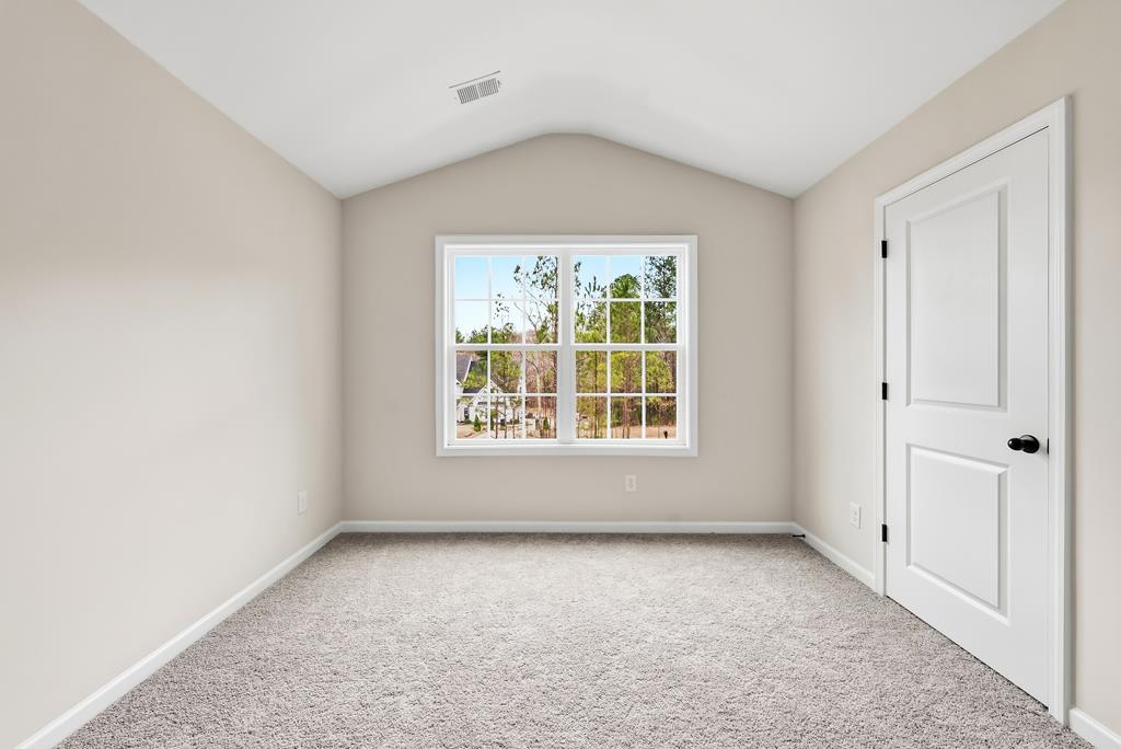 75 Oak Ridge Drive Waverly Hall, GA 31831 - Photo 39 of 40 an empty room with a window