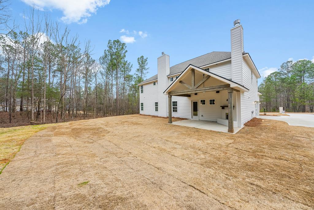 75 Oak Ridge Drive Waverly Hall, GA 31831 - Photo 40 of 40 a house with trees in front of it
