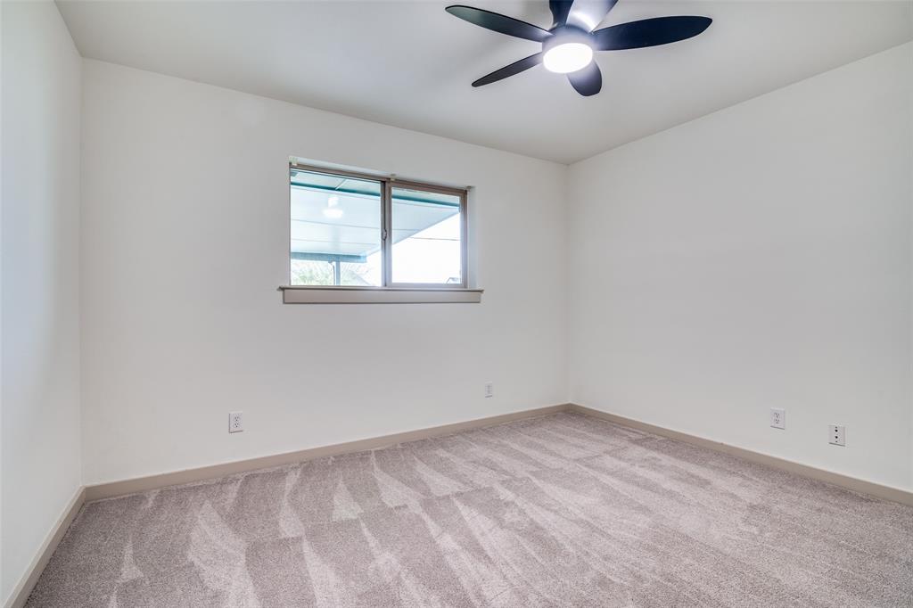 5109 Old Gate Lane Parker, TX 75002 - Photo 16 of 24 an empty room with a window and a fan
