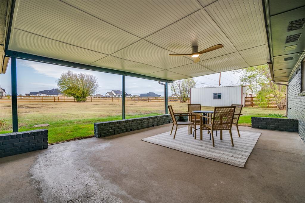 5109 Old Gate Lane Parker, TX 75002 - Photo 21 of 24 a view of a patio with a table chairs and a patio