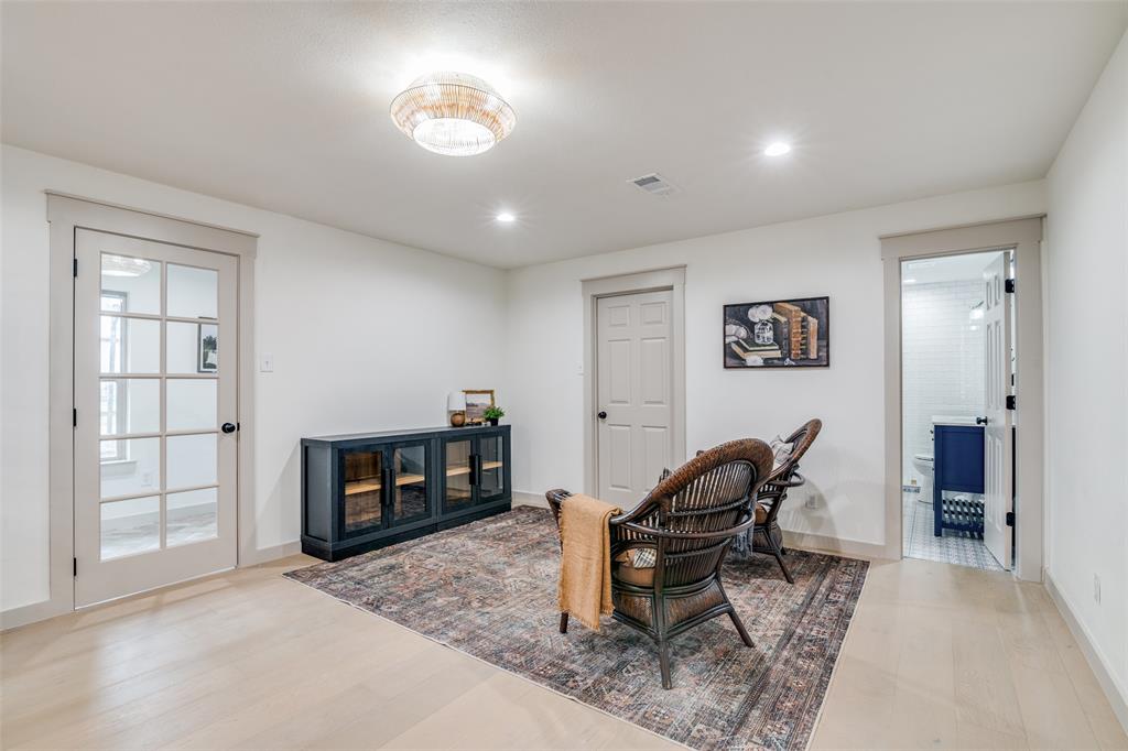 5109 Old Gate Lane Parker, TX 75002 - Photo 10 of 24 a living room with furniture and a fireplace