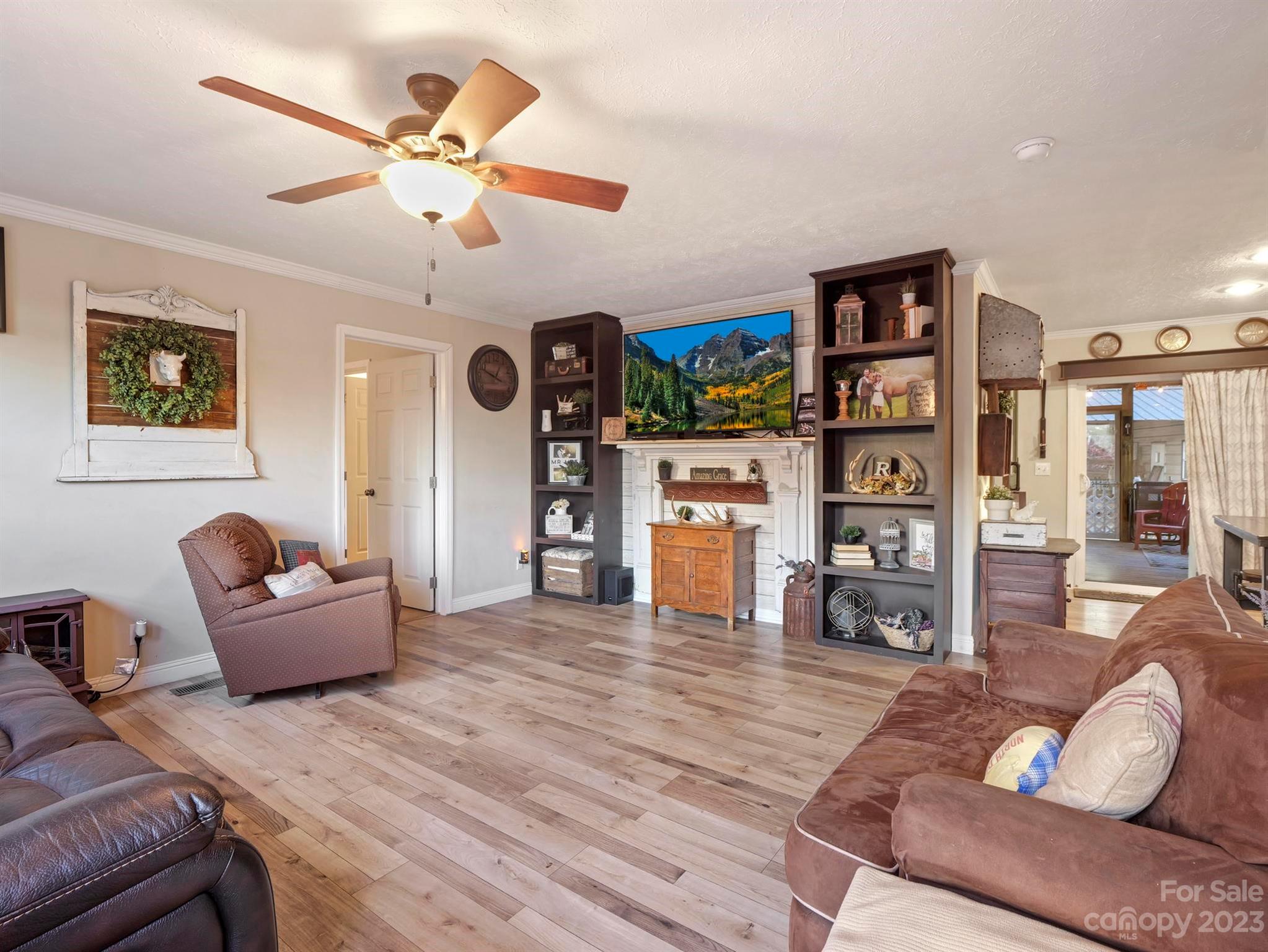 139 Phils Circle Rutherfordton, NC 28139 - Photo 11 of 37 a living room with furniture and a wooden floor
