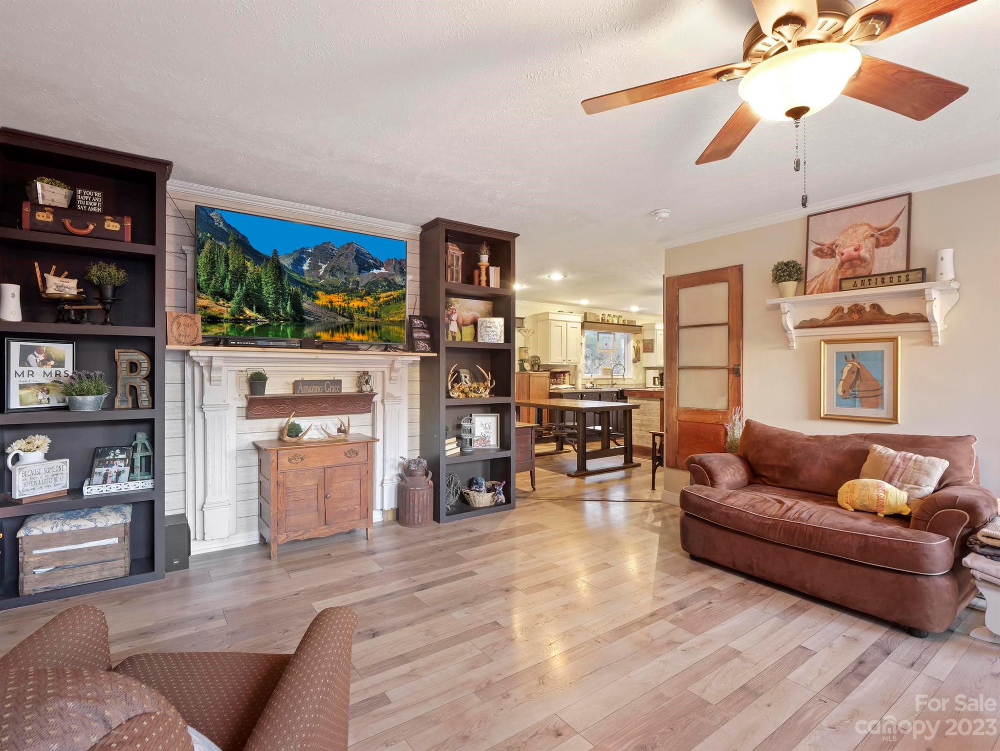 139 Phils Circle Rutherfordton, NC 28139 - Photo 12 of 37 a living room with furniture and a wooden floor