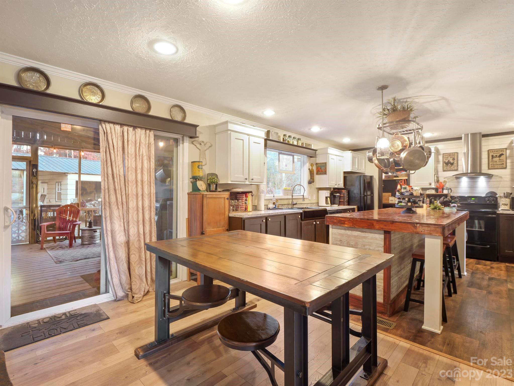 139 Phils Circle Rutherfordton, NC 28139 - Photo 13 of 37 a view of a dining area with furniture and a table