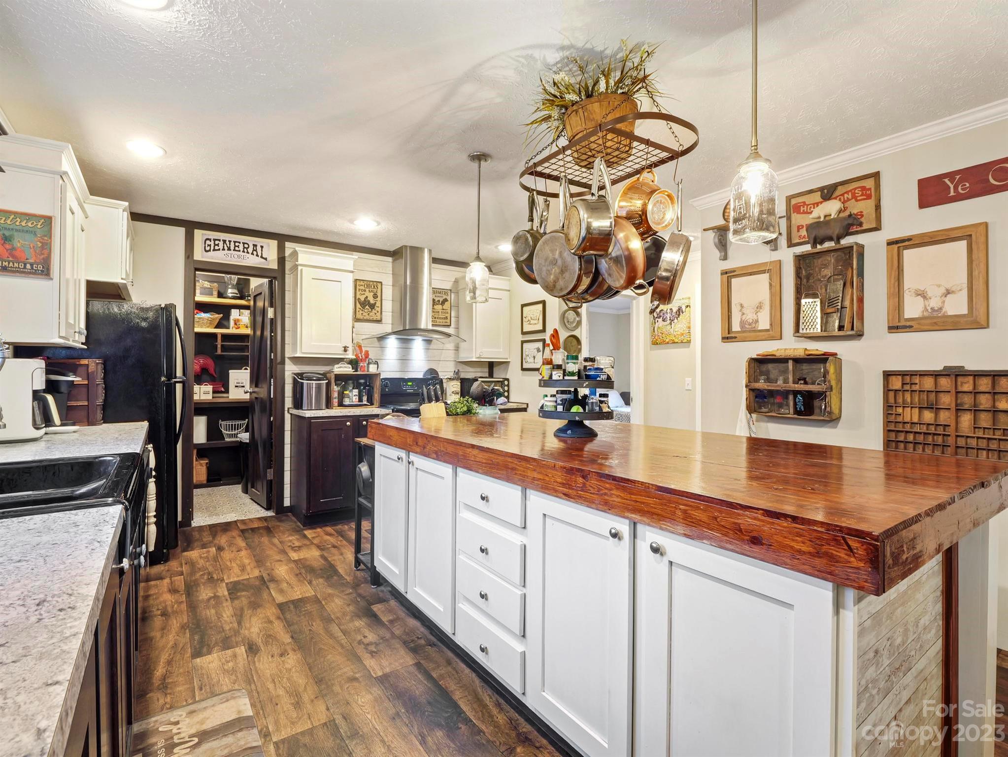 139 Phils Circle Rutherfordton, NC 28139 - Photo 16 of 37 a kitchen with stainless steel appliances granite countertop a sink and cabinets