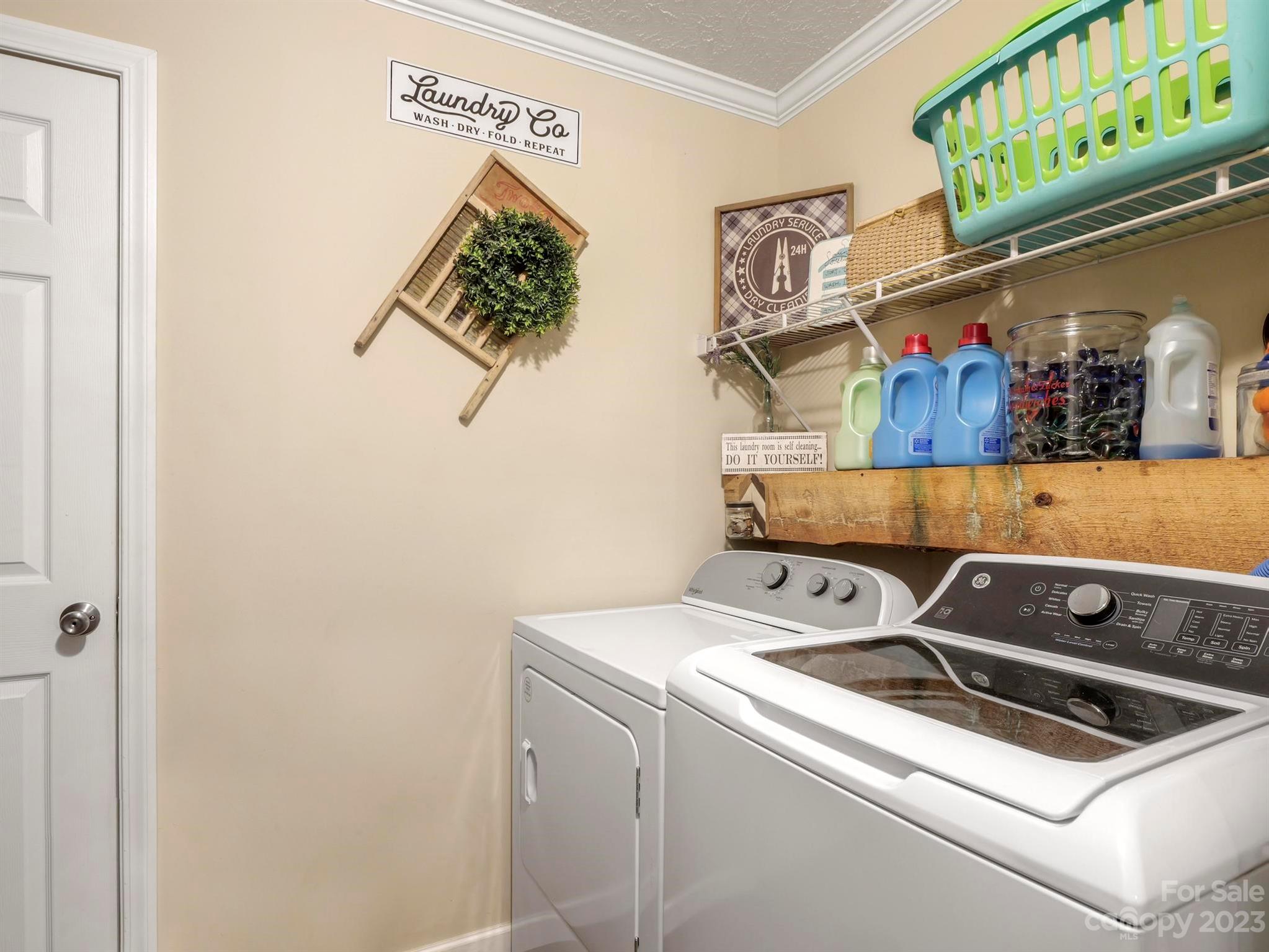 139 Phils Circle Rutherfordton, NC 28139 - Photo 27 of 37 a utility room with dryer and washer