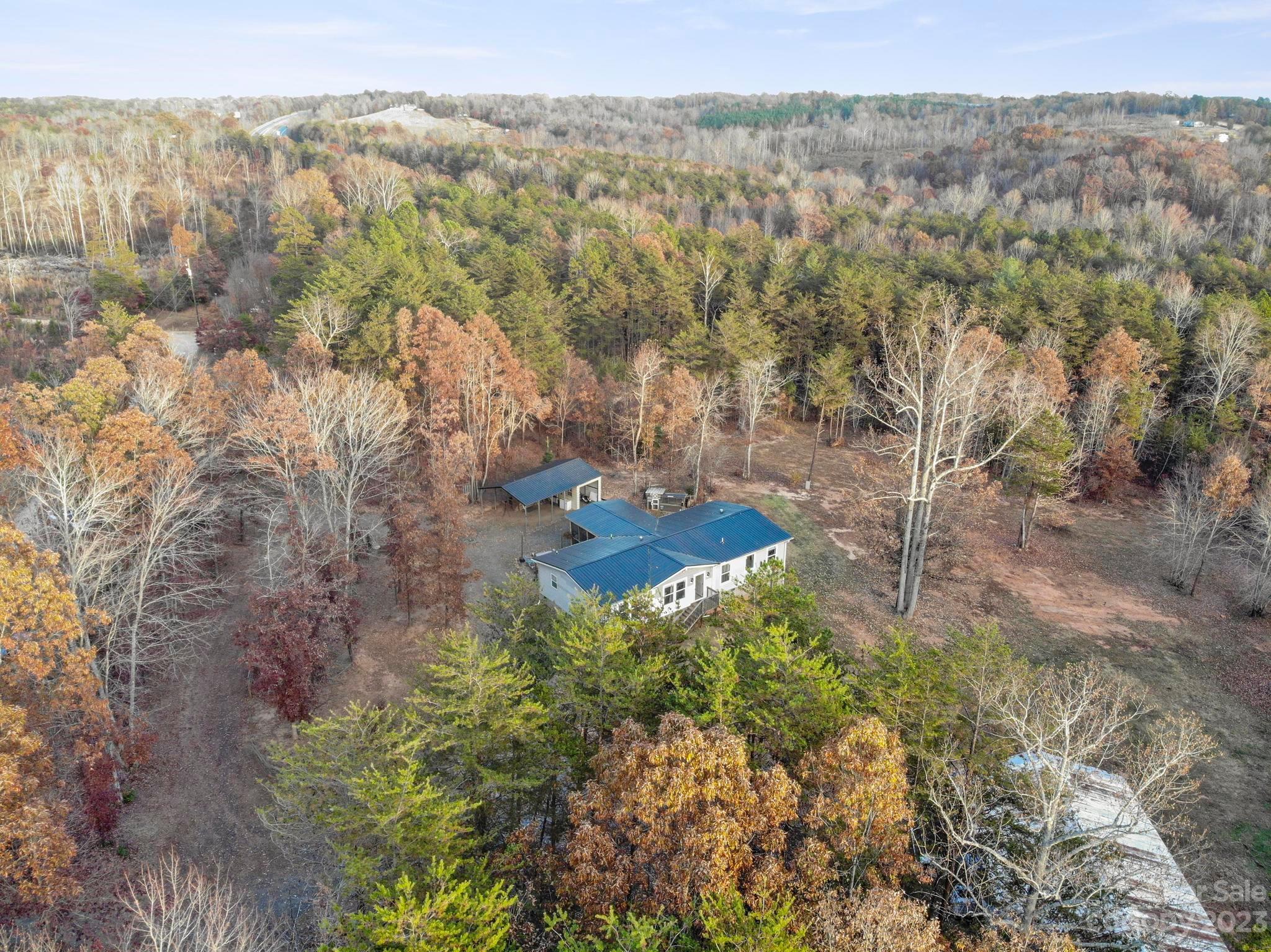 139 Phils Circle Rutherfordton, NC 28139 - Photo 31 of 37 a view of a yard with a tree