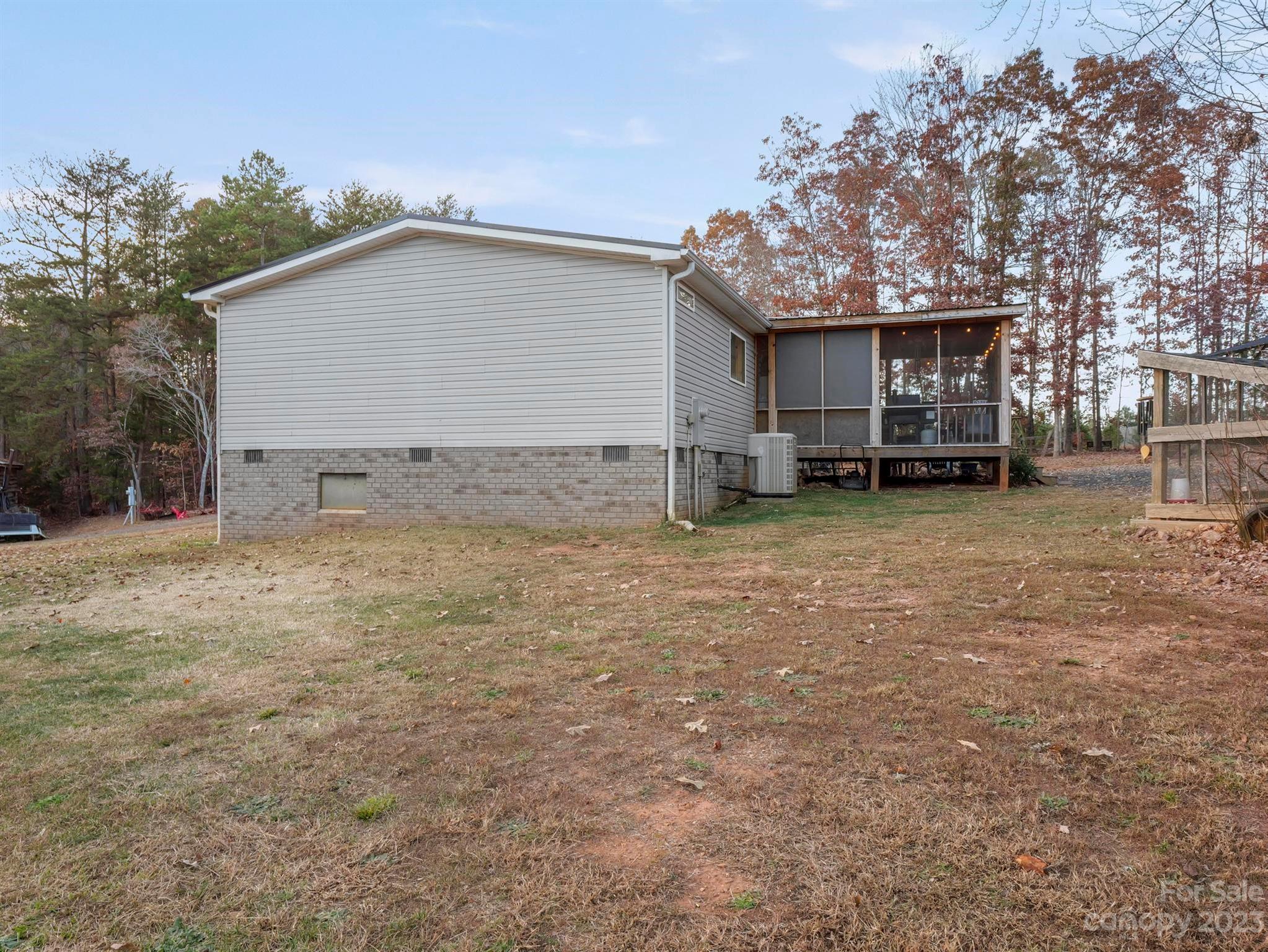 139 Phils Circle Rutherfordton, NC 28139 - Photo 4 of 37 a view of a house with a outdoor space