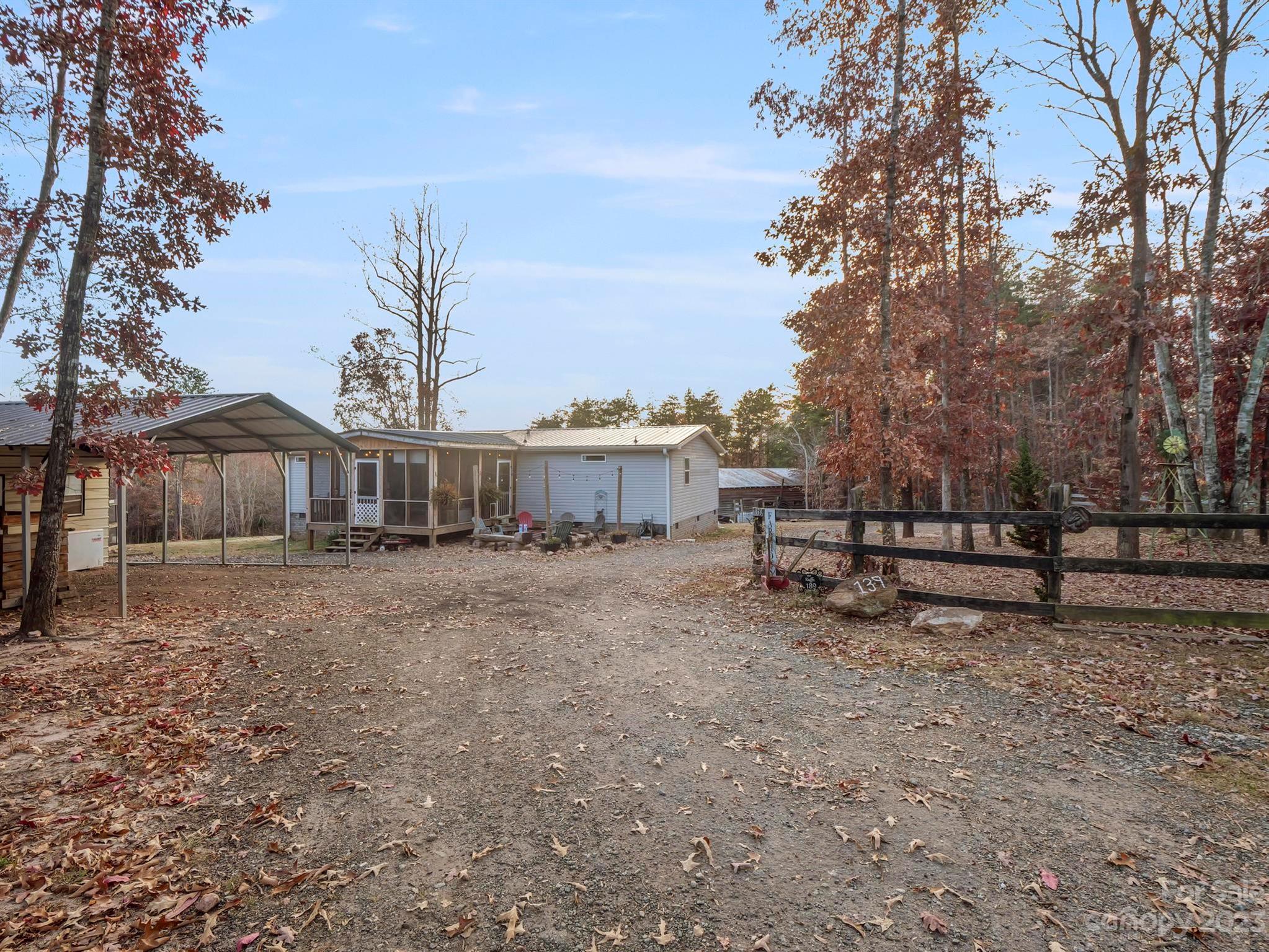 139 Phils Circle Rutherfordton, NC 28139 - Photo 5 of 37 a view of a house with yard and sitting area