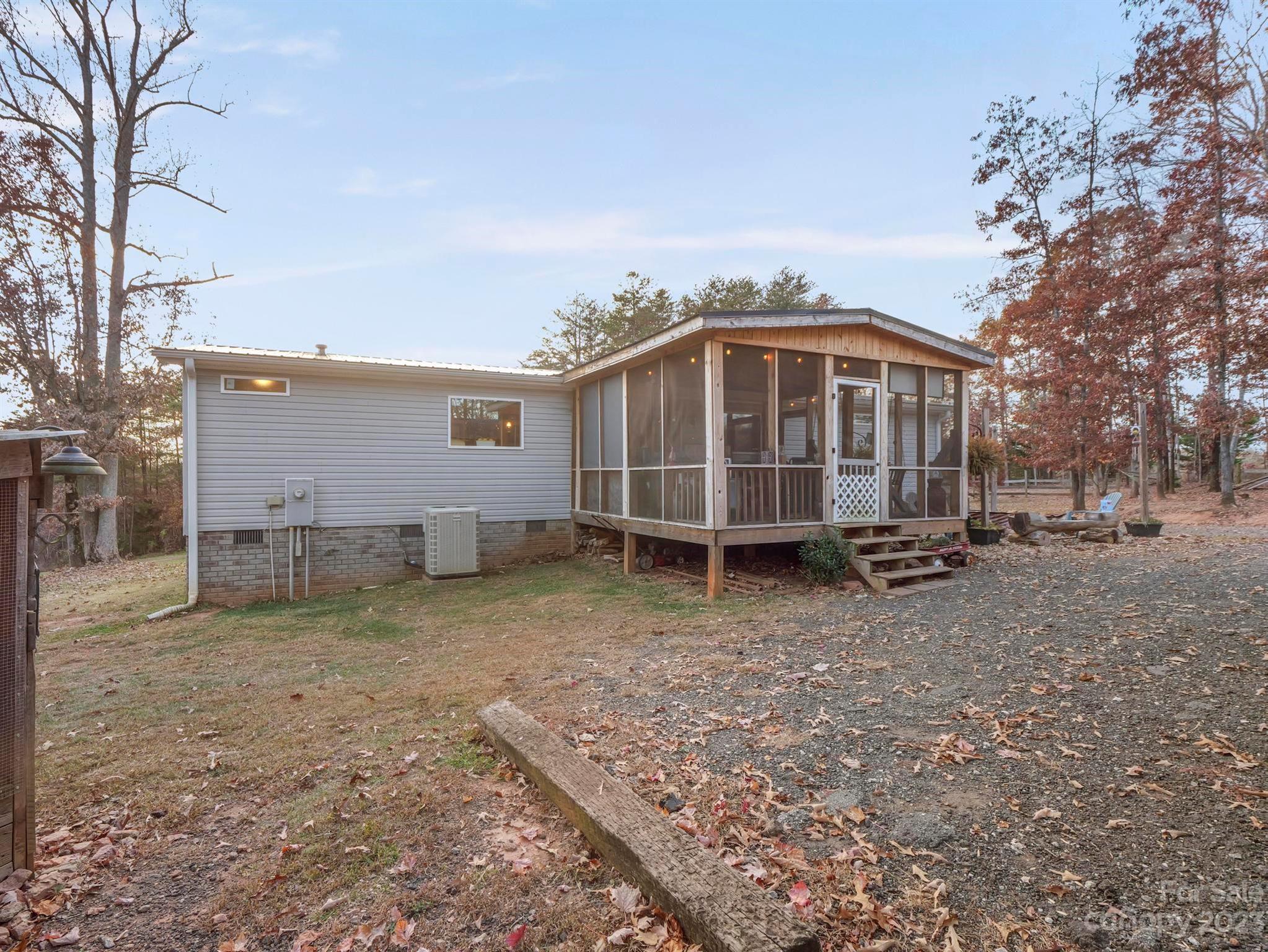 139 Phils Circle Rutherfordton, NC 28139 - Photo 6 of 37 a view of a house with a yard