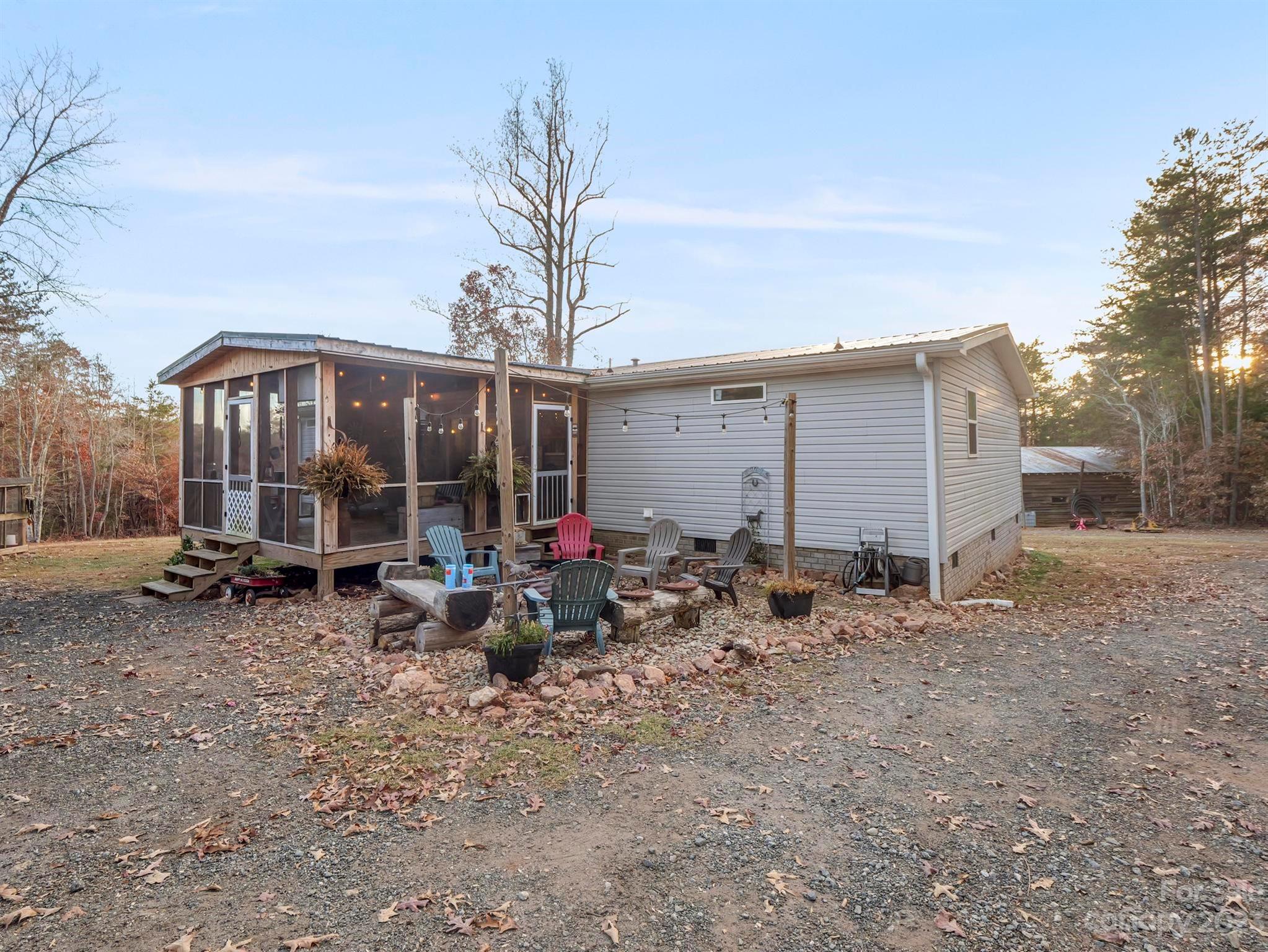 139 Phils Circle Rutherfordton, NC 28139 - Photo 8 of 37 a view of a house with backyard