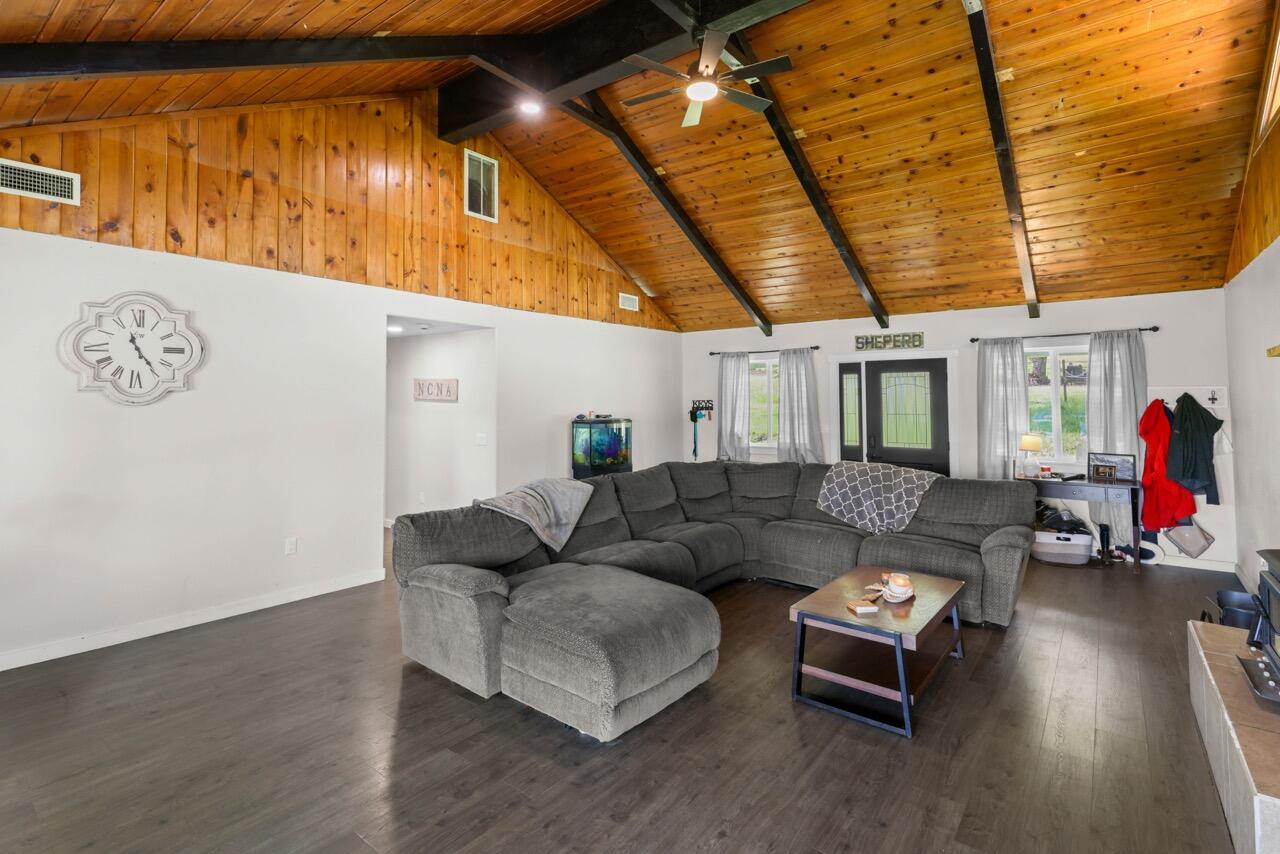380 Greenleaf Drive Eagle Point, OR 97524 - Photo 10 of 31 a living room with furniture and a wooden floor