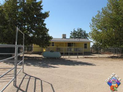 11357 Eaby Road Phelan, CA 92371 - Photo 18 of 18 a view of a house with backyard and sitting area