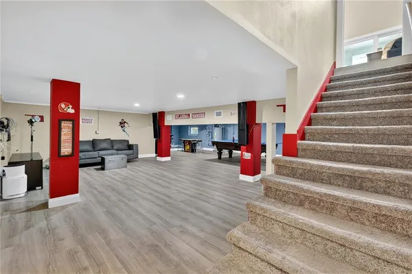 a utility room with sink dryer and washer