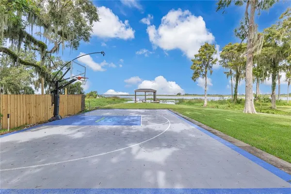 a view of a garden with an outdoor seating