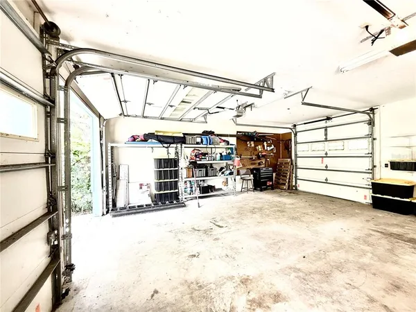 a view of wooden floor and a floor to ceiling window