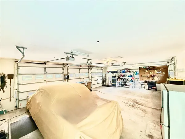 an aerial view of a house with garden space and outdoor space