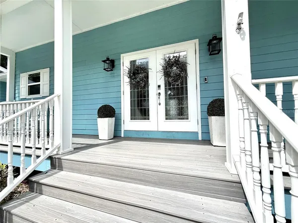 a view of a lake in middle of forest