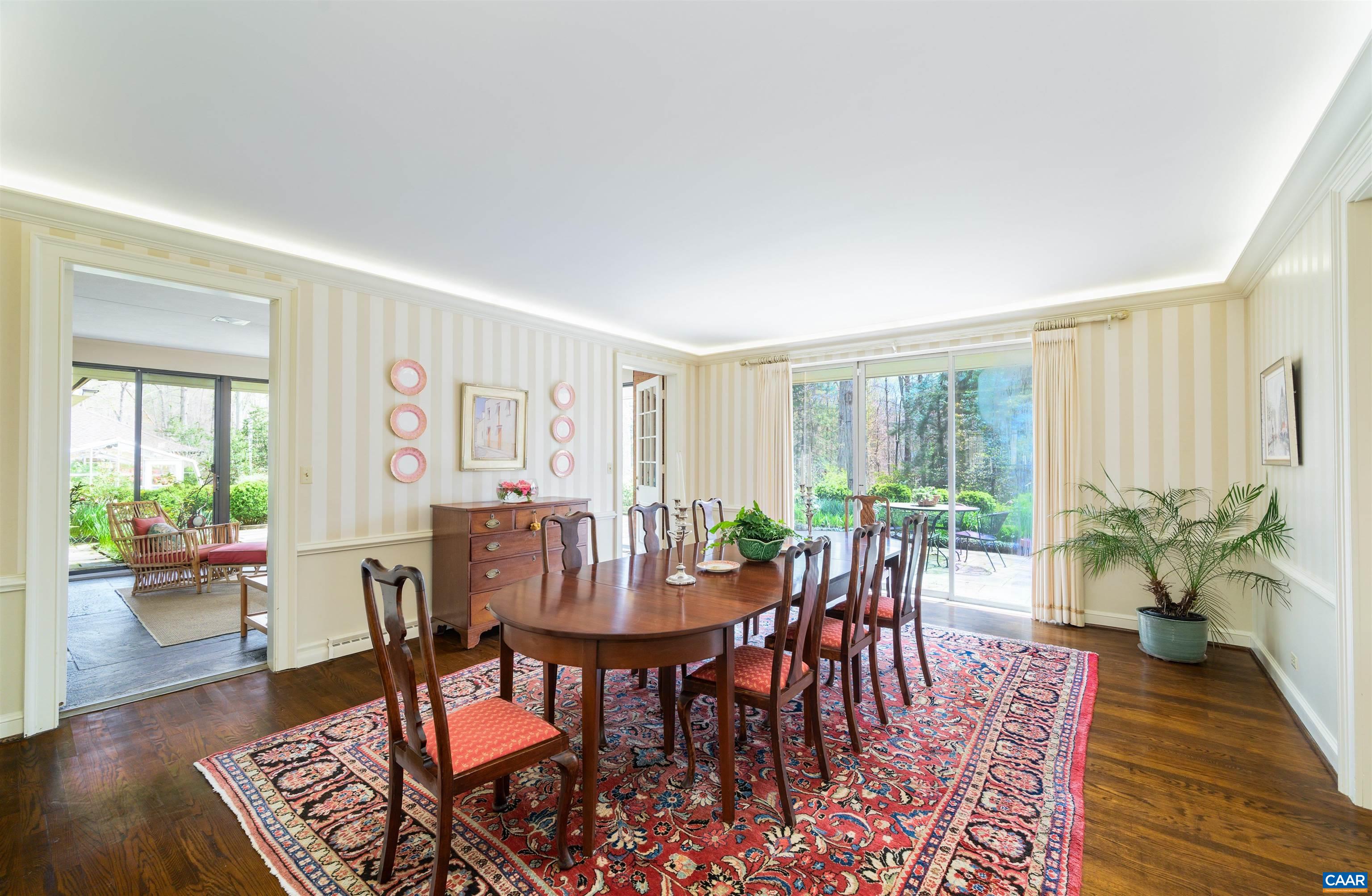 275 Terrell Road West Charlottesville, VA 22901 - Photo 18 of 68 a view of a dining room with furniture window and wooden floor