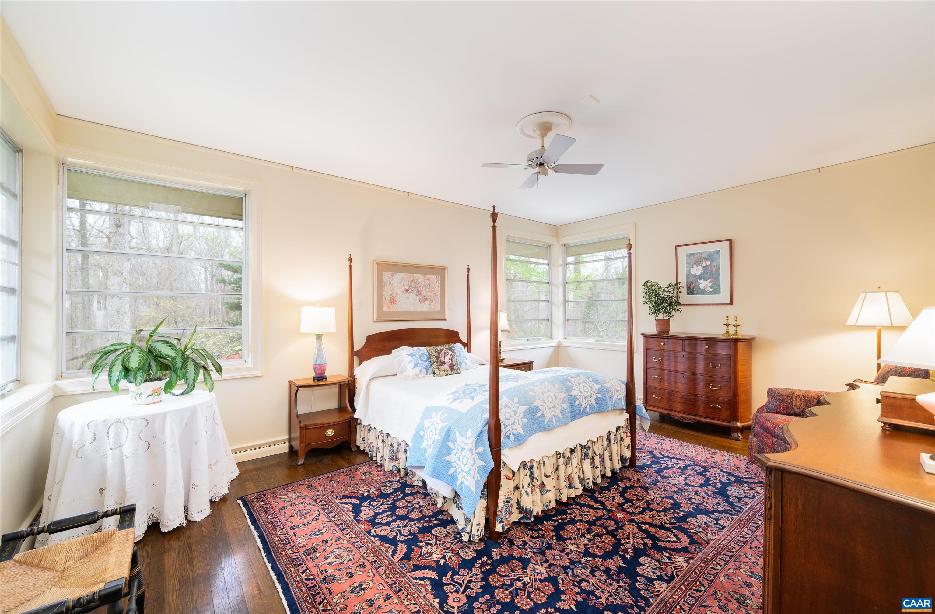 275 Terrell Road West Charlottesville, VA 22901 - Photo 34 of 68 a bed room with a bed and a lamp