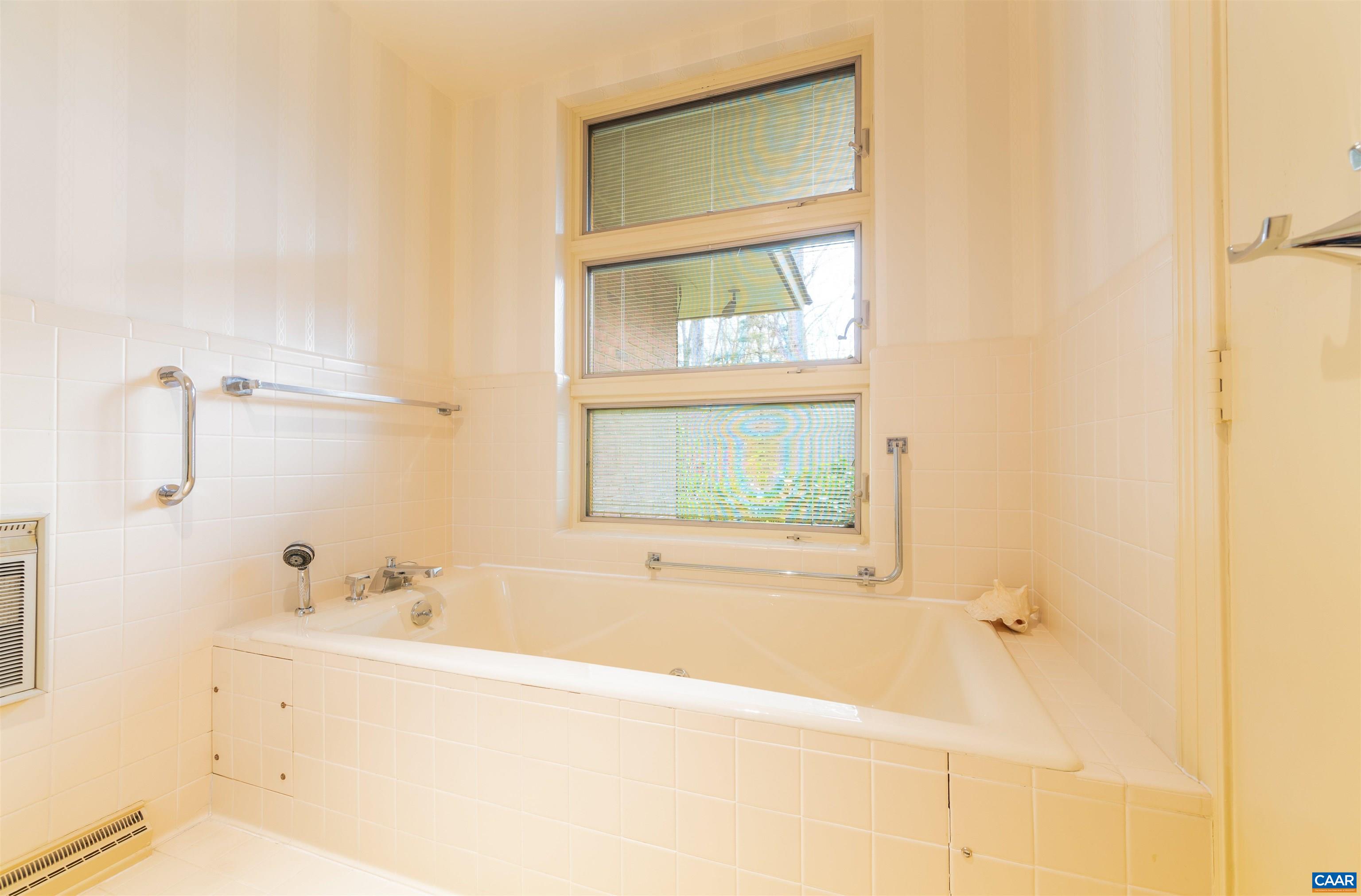 275 Terrell Road West Charlottesville, VA 22901 - Photo 38 of 68 a bathroom with a tub sink and mirror