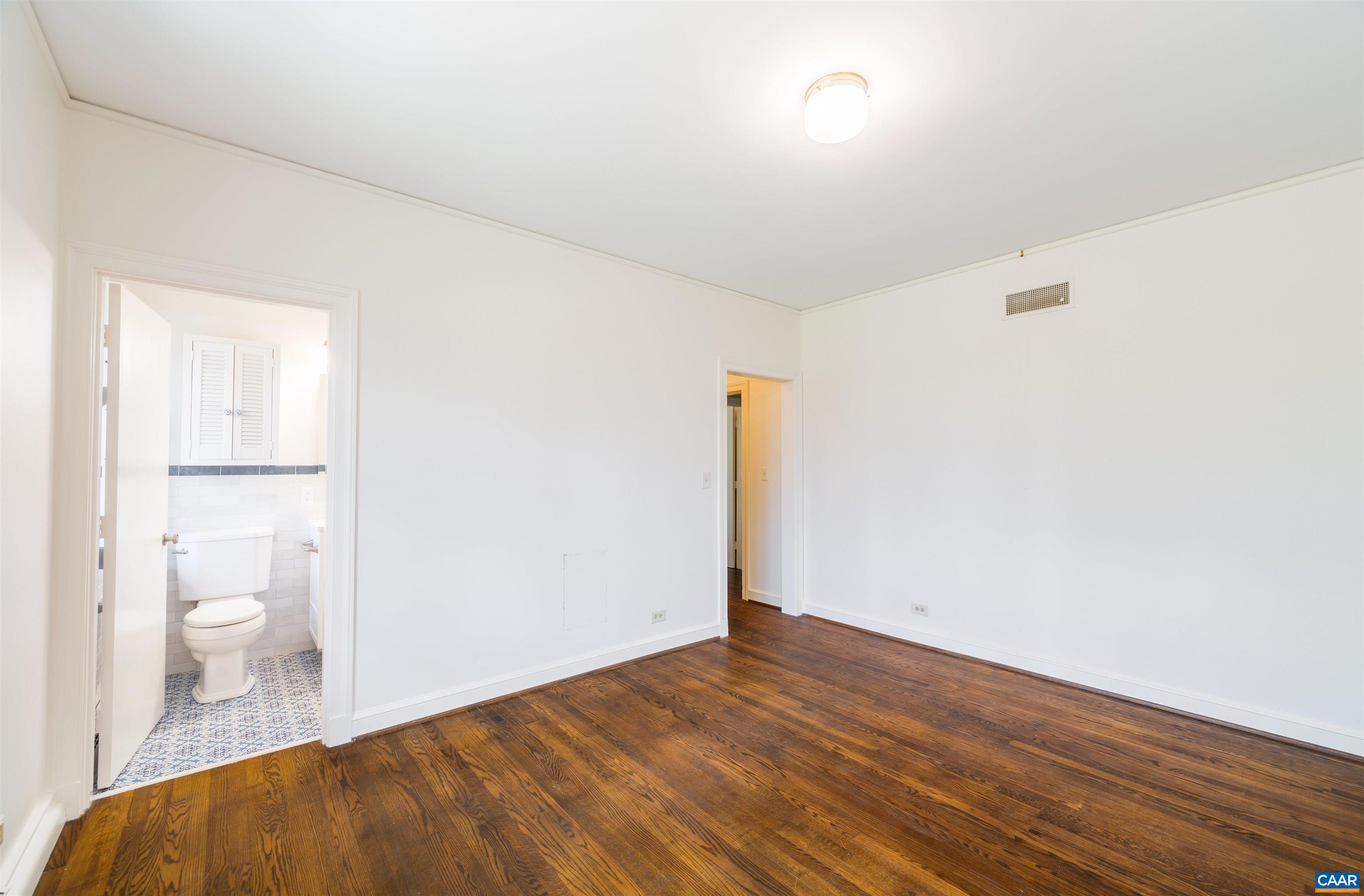 275 Terrell Road West Charlottesville, VA 22901 - Photo 40 of 68 a view of a room with wooden floor and toilet