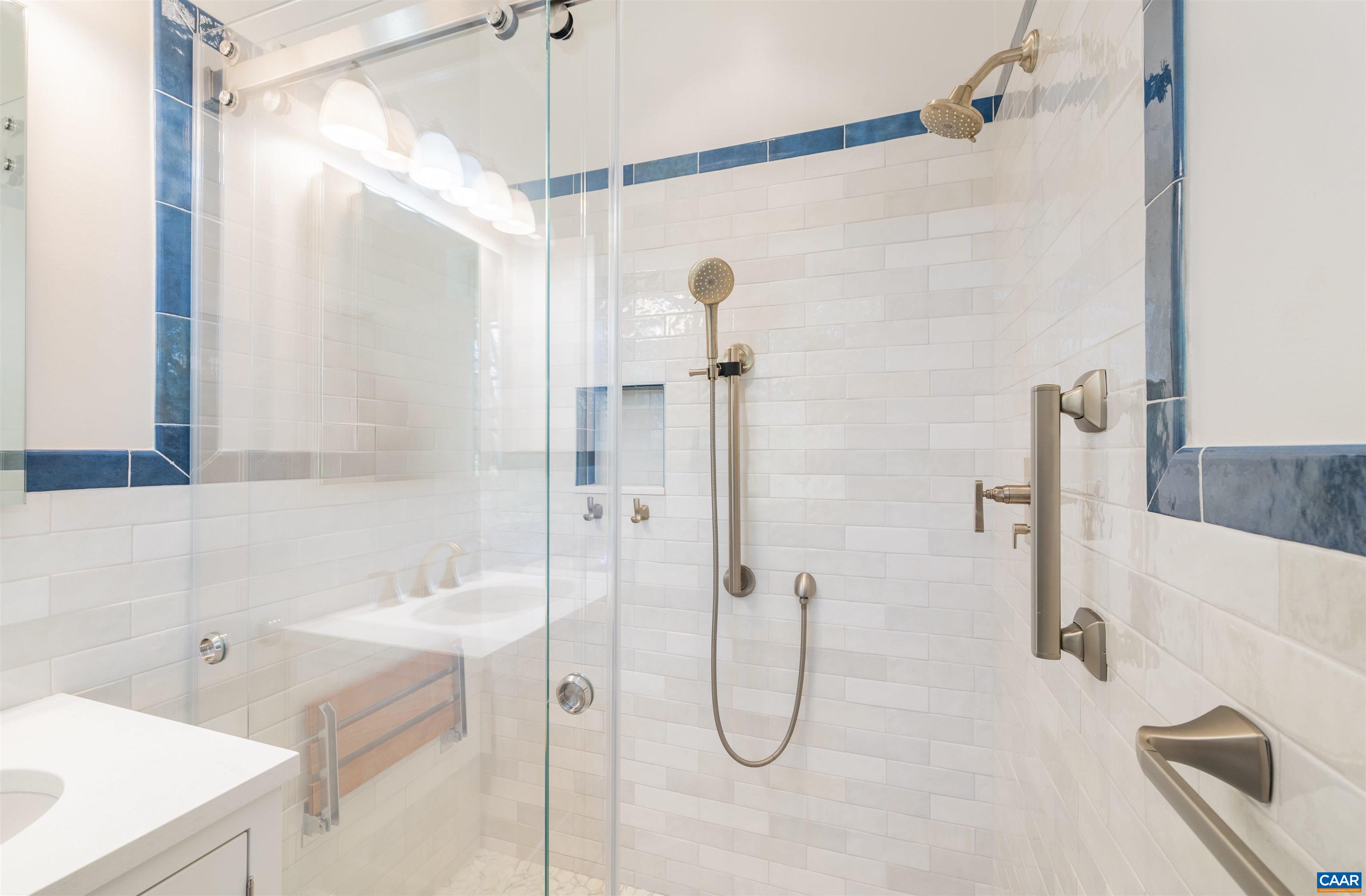 275 Terrell Road West Charlottesville, VA 22901 - Photo 42 of 68 a bathroom with a sink a mirror and a shower
