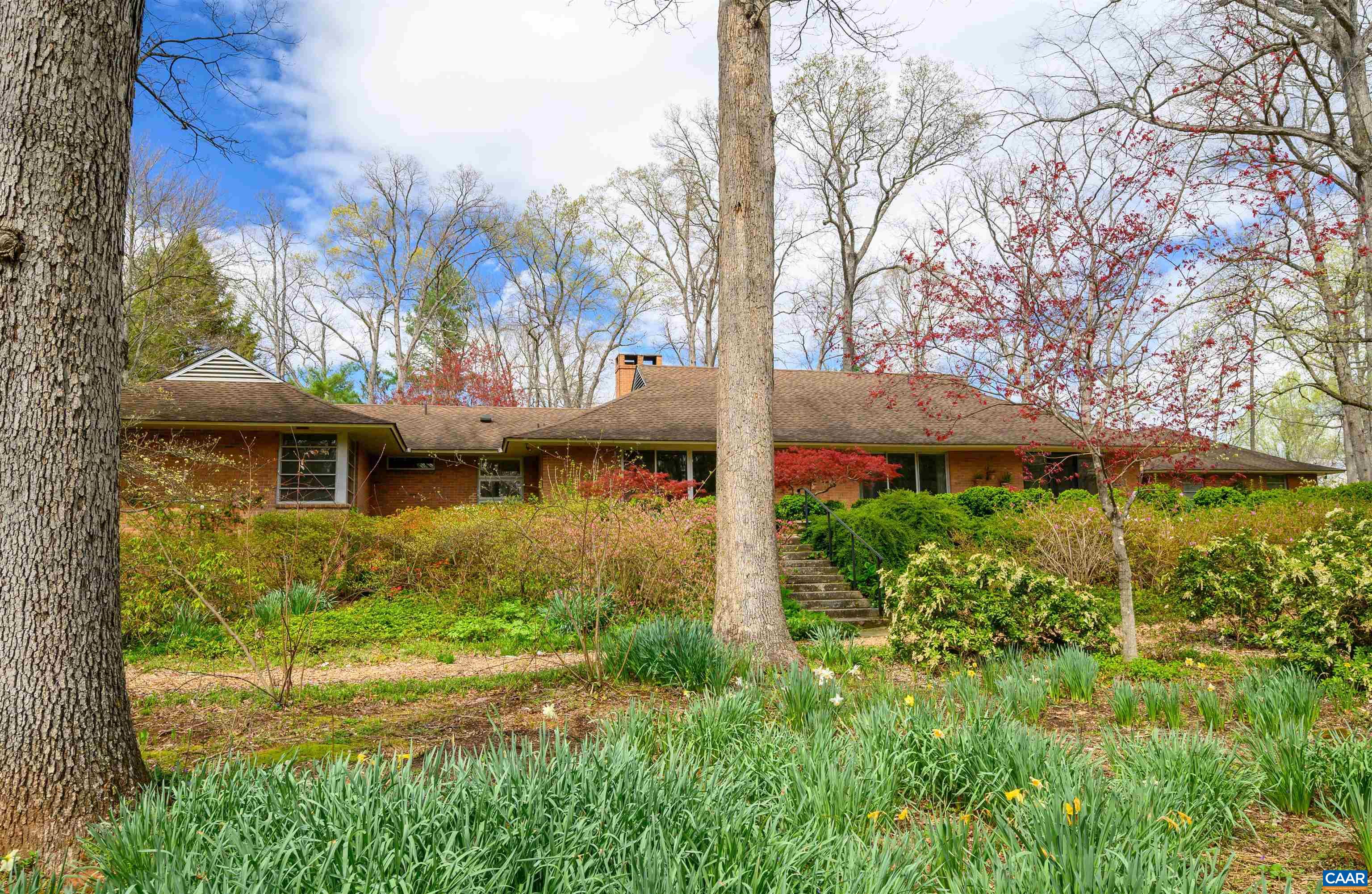 275 Terrell Road West Charlottesville, VA 22901 - Photo 51 of 68 a front view of a house with garden