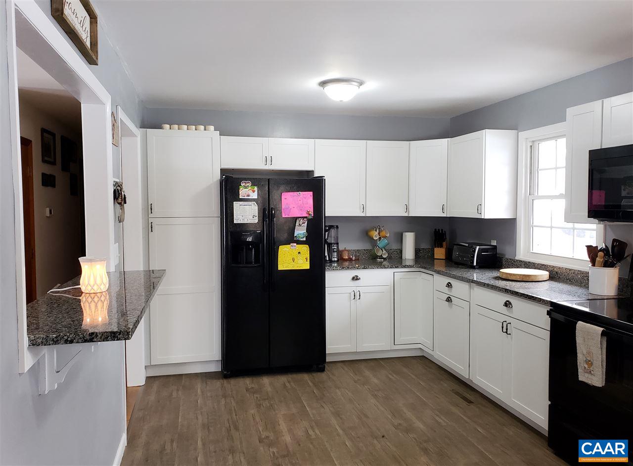 1141 Good Hope Church Road Aroda, VA 22709 - Photo 4 of 17 a kitchen with stainless steel appliances granite countertop a refrigerator sink and stove